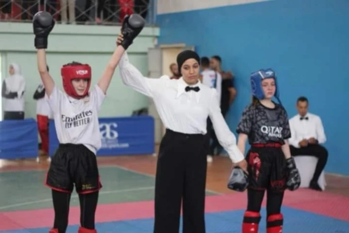 "سعد شملول زينب" مدربة وحكمة لرياضة "الكيك بوكسينغ"  مثال عن المرأة المثابرة