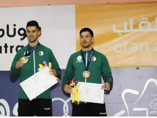 الثنائي معمري ومدال يهديان الجزائر ميدالية ذهبية عن كرة الريشة